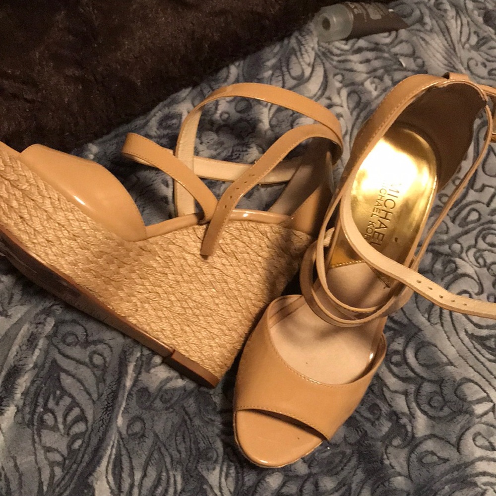 Beige leather Michael Kors wedges.